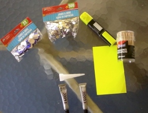 from l to r: rhinestones, highlighter to draw pattern, toothpicks and card to help apply glue, E6000 glue with nozzle